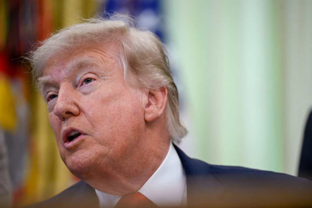 What to know about Trump's $100,000 H-1B visa fee, and the legal rebuke that followed
