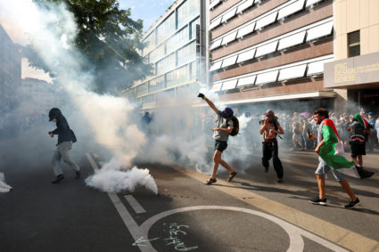 Protesters in Geneva clash with police ahead of the G7 summit in nearby France