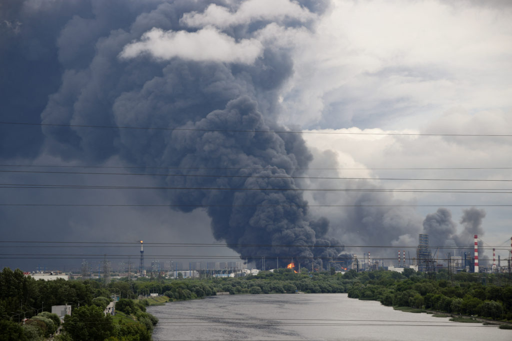 Ukrainian drones set a Moscow refinery ablaze in a major attack on the Russian capital