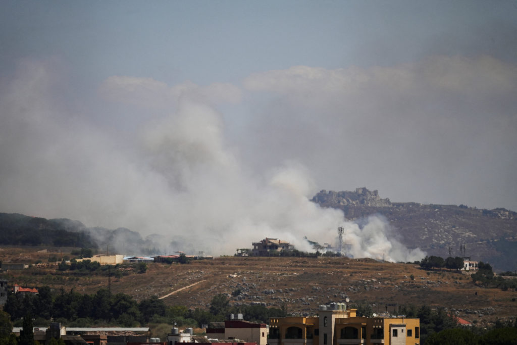 Smoke billows from southern Lebanon following an Israeli strike, as seen from Kfartibnit