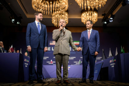 Pakistan's Prime Minister Shehbaz Sharif speaks standing between U.S. Vice President JD Vance and Qatar's Prime Minister S...