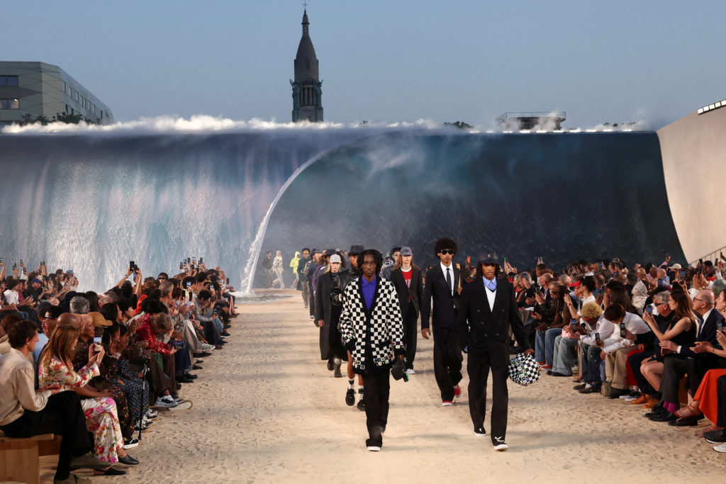 Heat catches Europe's fashion industry unprepared as models face the sun in fur and wool