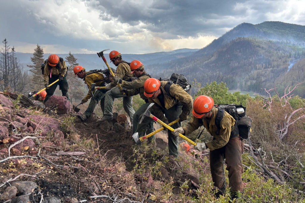 Dangerous weather hampers firefighters and leads to fireworks bans in western U.S.