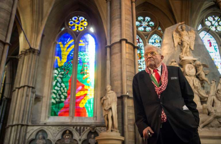 FILE PHOTO: British artist David Hockney poses in front of The Queen's Window, a new stained glass window he has designed,...