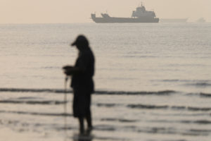 Vessels in the Strait of Hormuz are visible near the beach of Bandar Abbas
