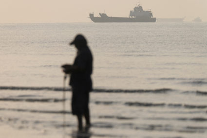 Vessels in the Strait of Hormuz are visible near the beach of Bandar Abbas