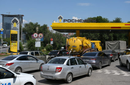 FILE PHOTO: Cars queue to refuel at a petrol station in Rostov-on-Don