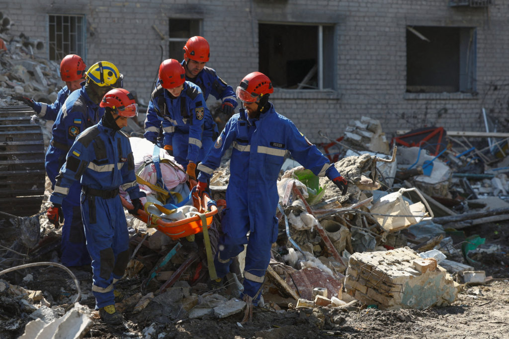 Heavy Russian strikes kill at least 21 in Kyiv after Ukrainian strikes disrupt Moscow's oil sector