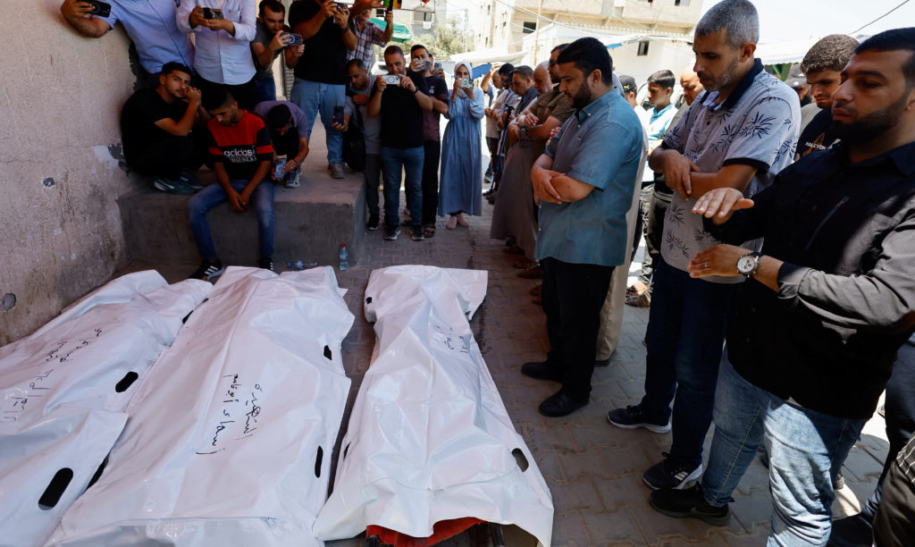 Israel's latest strikes kill at least a dozen people in Gaza, including police officers