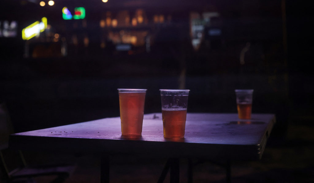 Full pints of beer left by England fans sit on a table after England lost the FIFA World Cup 2026 Semi Final against Argen...