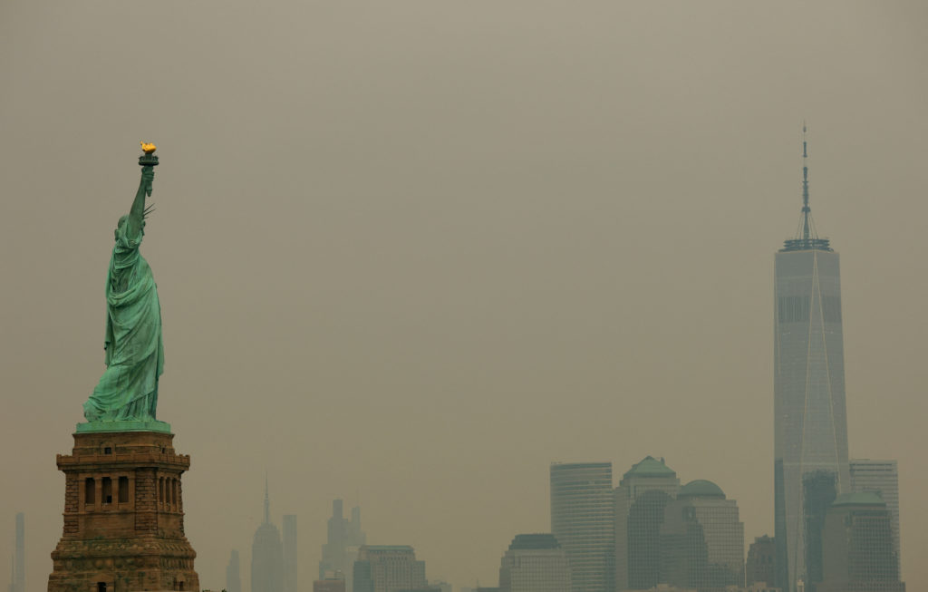 As wildfire smoke makes air unhealthy from Midwest to East Coast, officials say stay inside
