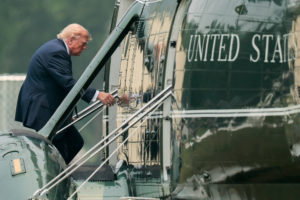 U.S. President Donald Trump boards Marine One near the White House in Washington