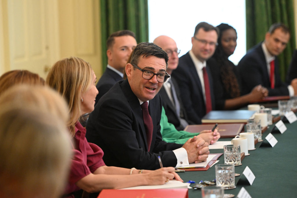 UK's new prime minister gathers his Cabinet after sweeping away Starmer supporters