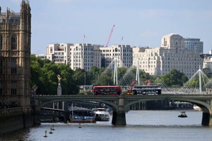 Police boat crashes into central London bridge, sending officers into River Thames