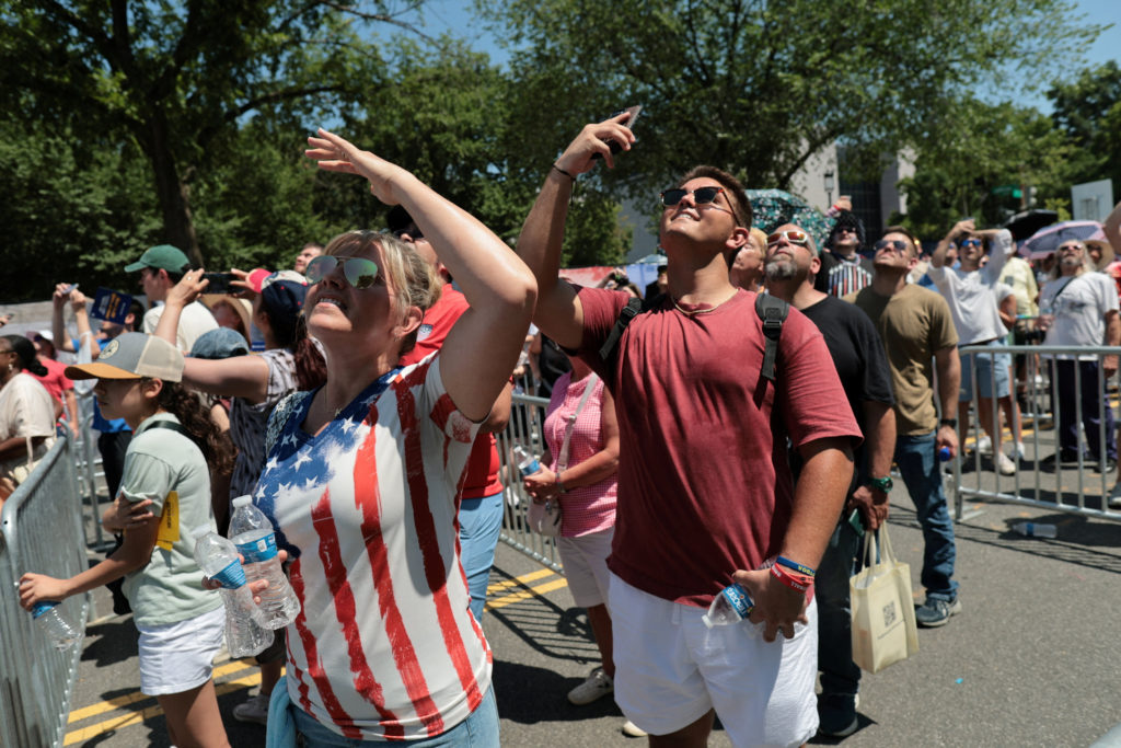 People brave heat to mark the 250th anniversary of U.S. independence, in Washington