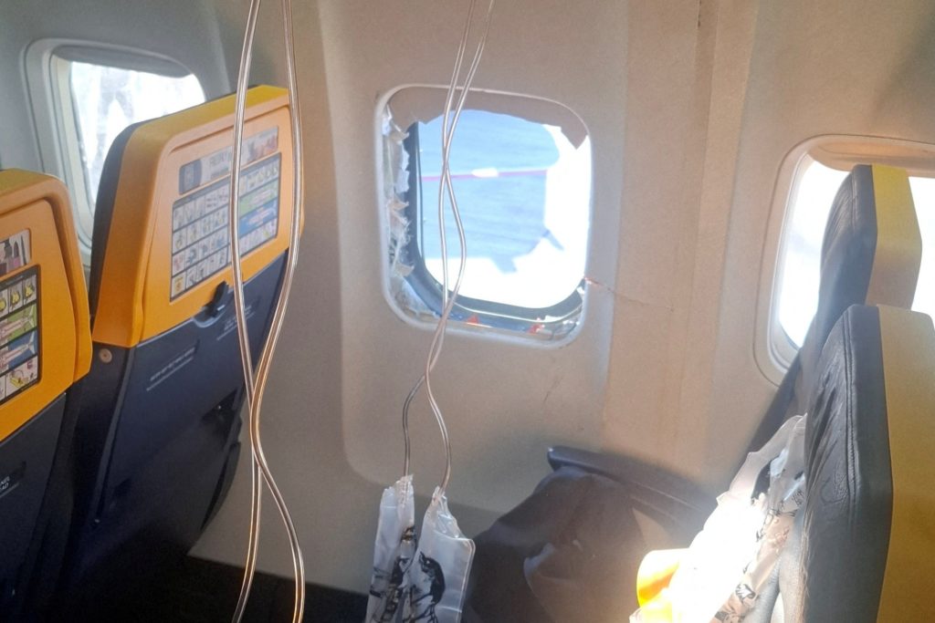 A broken window and the interior of the Ryanair aircraft, following a reported emergency landing, in location given as The...