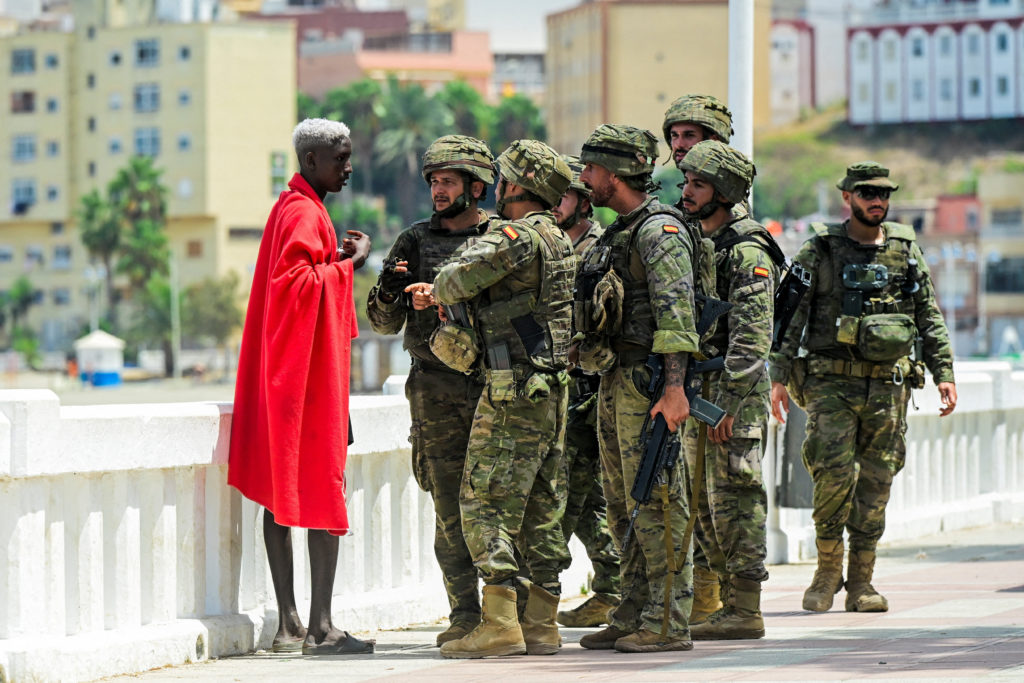 Mass crossings of migrants on foot and by sea from Morocco into Spanish territory, in Ceuta