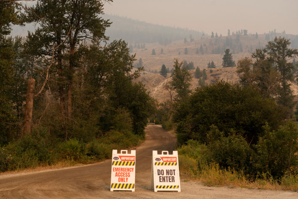 Thousands evacuated as wildfires burn across western U.S. and Canada