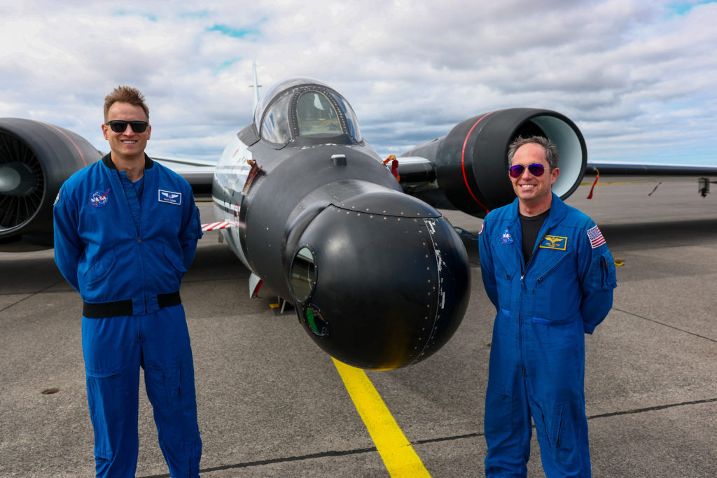 Klemm sensor equipment operator and pilot Gustine of NASA's Johnson Space Center pose in front of a WB-57 Canberra aircraf...