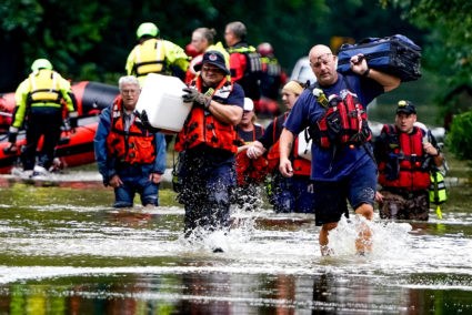 Evacuations are underway in the Ravenswood neighborhood due to flooding after days of heavy rain in Indianapolis