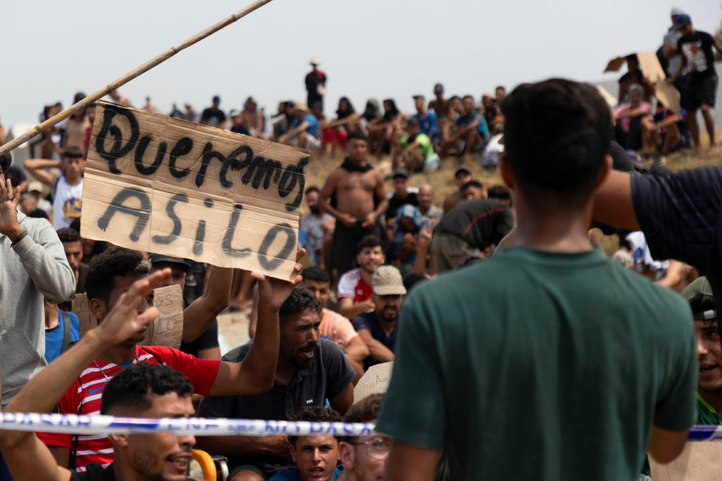 Moroccan security forces arrest nearly 300 migrants trying to reach Spain's Ceuta