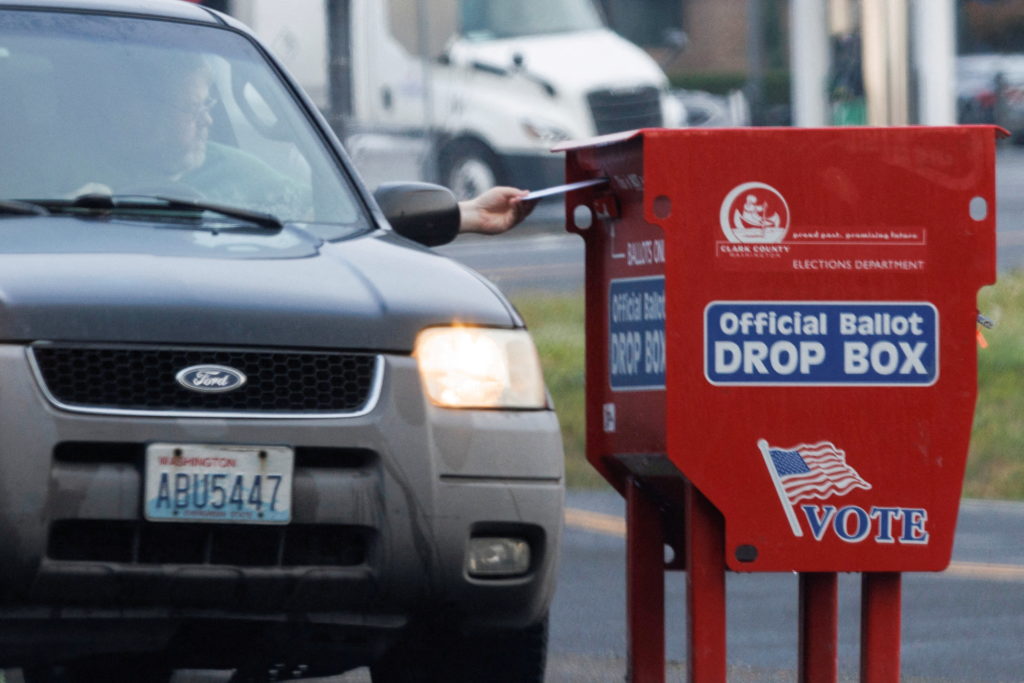 Ballots discounted for late postmarks surged in Washington and Oregon after Postal Service changes