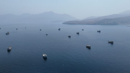 FILE PHOTO: A drone view shows vessels near the Strait of Hormuz, as seen from Musandam