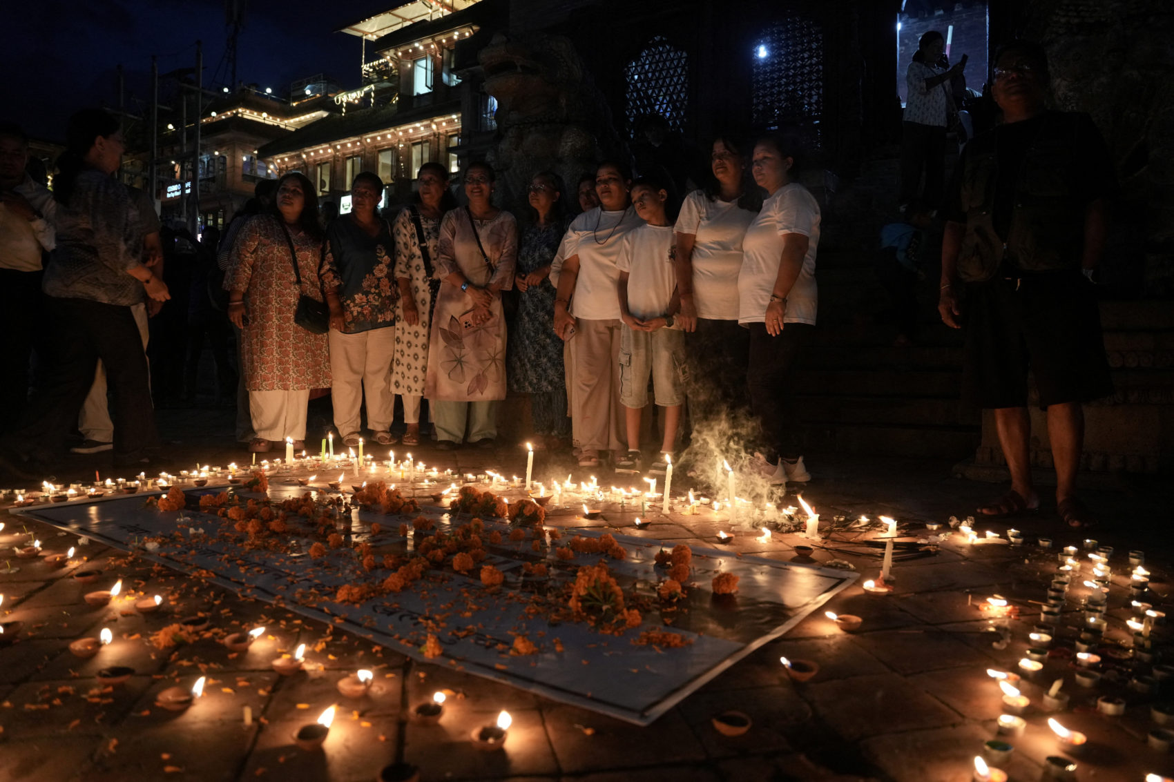 Butter lamps and candles are lit in the Basantapur Durbar Square in Kathmandu