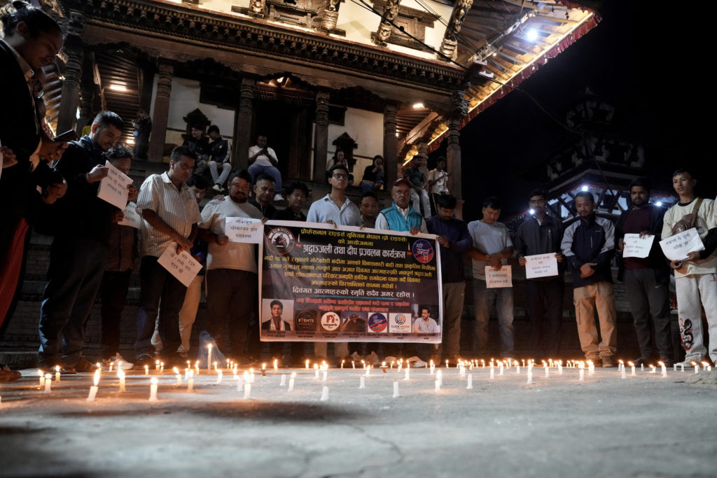 Nepal holds a day of mourning after floods kill at least 1,300 people