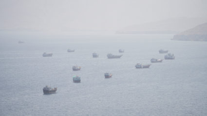 FILE PHOTO: Vessels near the Strait of Hormuz, as seen from Musandam