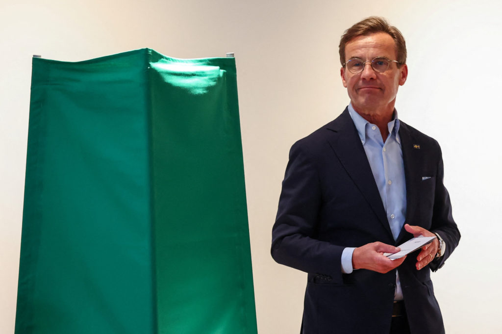 Swedish voters go to polls to choose a new parliament as hard right bids for role in government