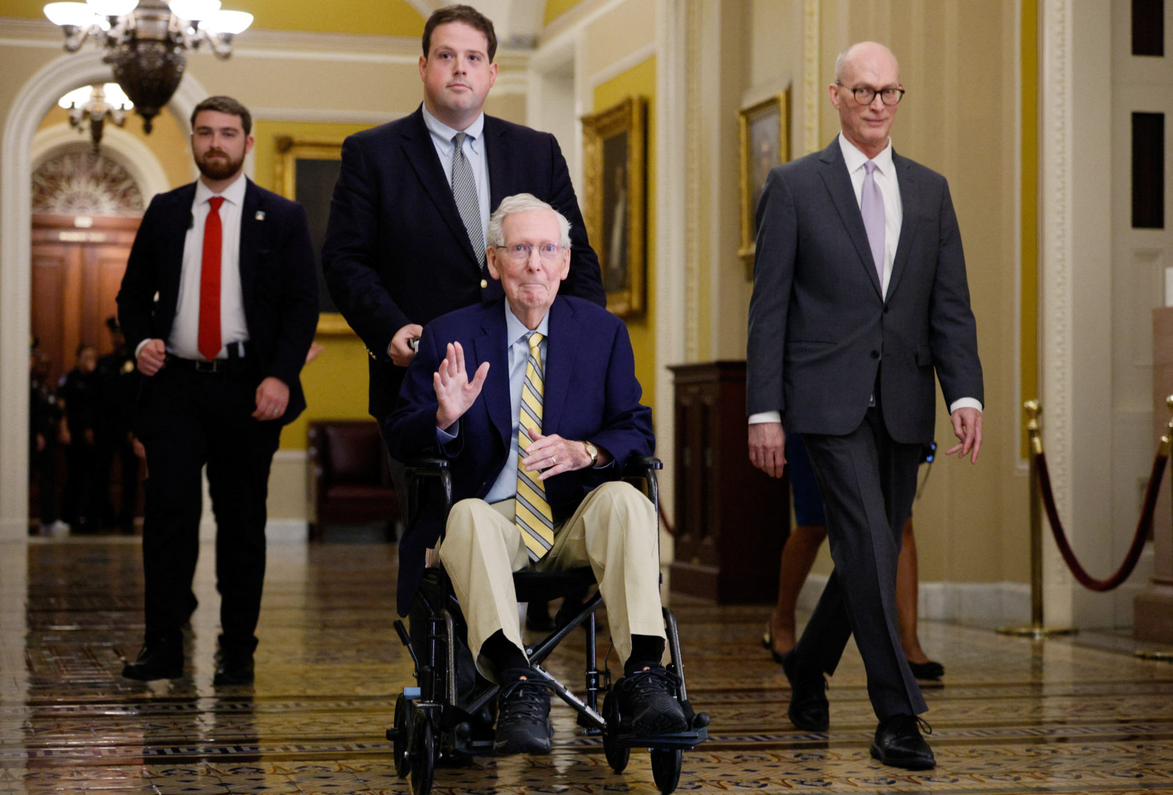 U.S. Senator Mitch McConnell speaks to reporters outside the Senate Chamber after returning to Capitol Hill in Washington