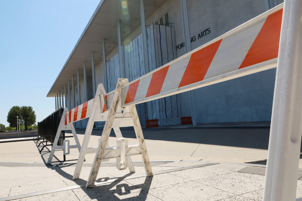 Fencing goes up around the main Kennedy Center building after Trump-aligned board votes to close it