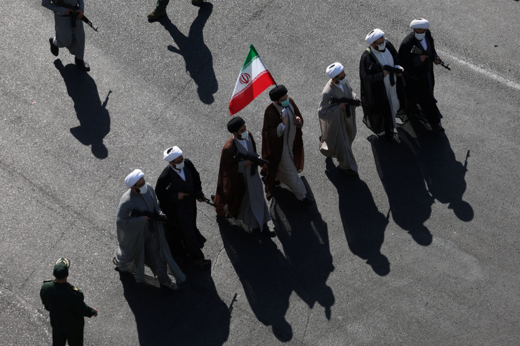 Iranians rally by the hundreds of thousands in biggest show of defiance since war began