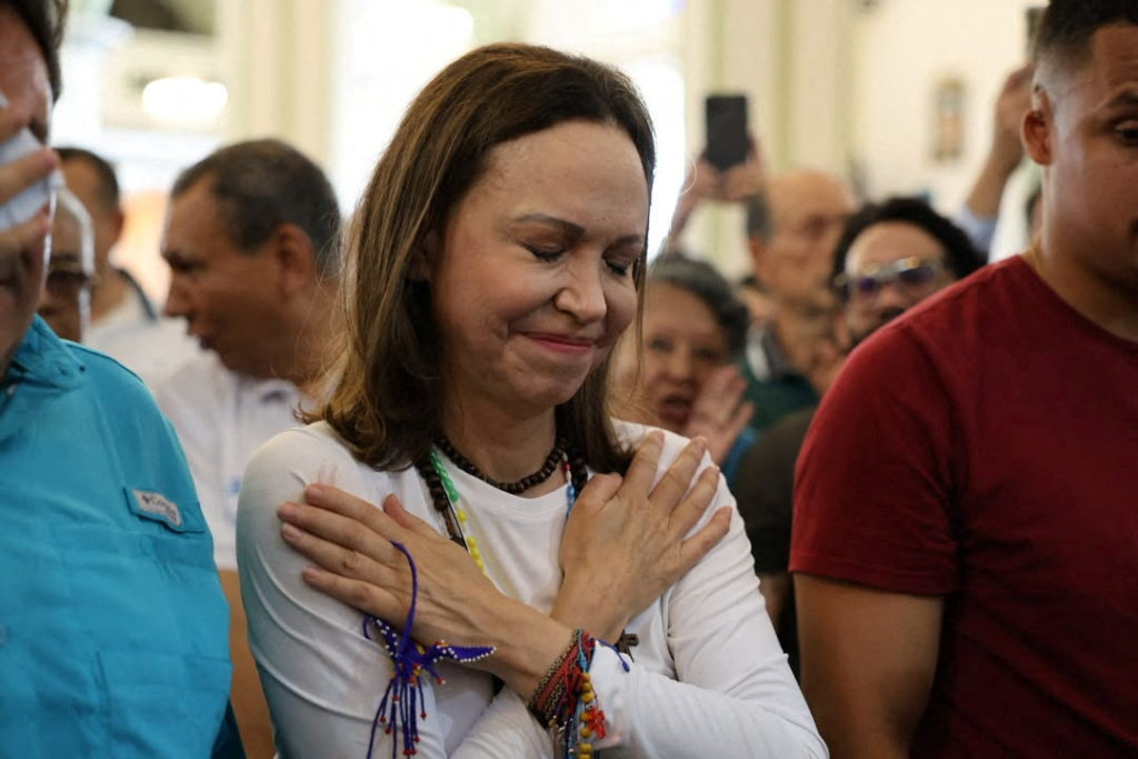 María Corina Machado greeting supporters in a church in Lara, Venezuela